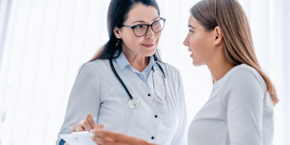 asian patient and doctor talking