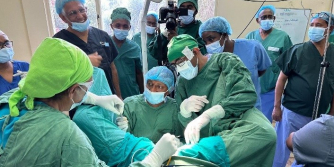 Surgical demonstration, leading surgeon in the middle: Dr Sunday Lengmang – operation to show new one sided tight PV sling  