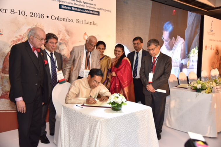 Signing Colombo Dec.jpg